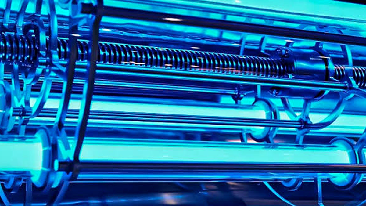 UV-C lamps glowing inside a water treatment system